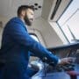 Professional driver sitting in Ship Image of Professional driver sitting in Ship